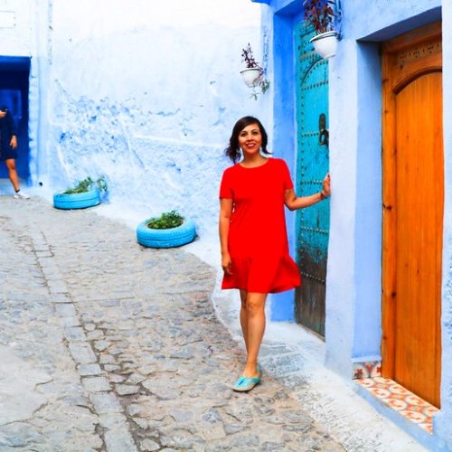 woman-taking-photo-in-chefchaouen